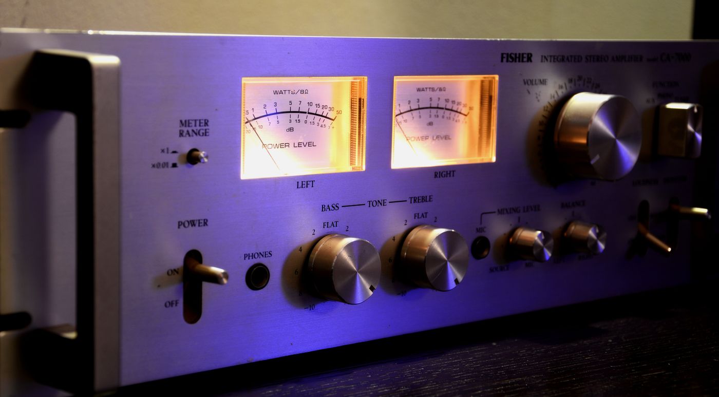 Vintage stereo amplifier with glowing dials